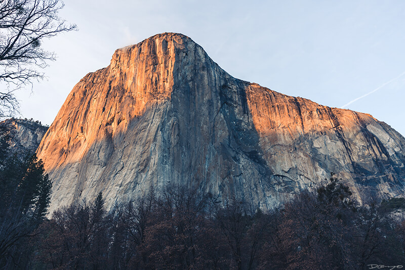 El Capitan illuminated by a sunset during golden hour in Yosemite, CA