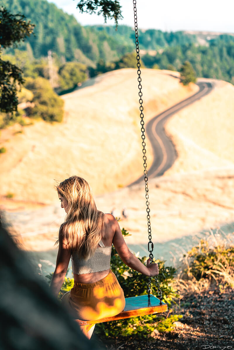 Carsen Suzanne, @carsensuzanne, on a swing on Mt Tamalpais, California.